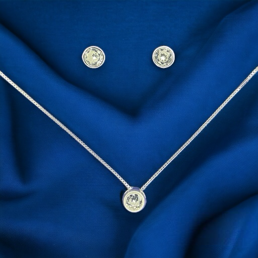 CONJUNTO DE PLATA FINA PUNTO DE LUZ CIRCÓN SIN VALIER