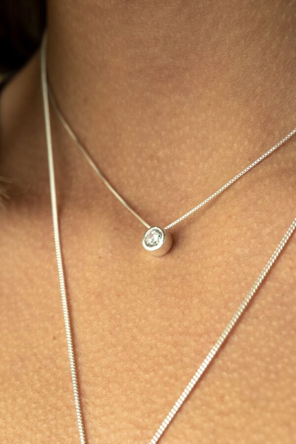 CONJUNTO DE PLATA FINA PUNTO DE LUZ CIRCÓN SIN VALIER