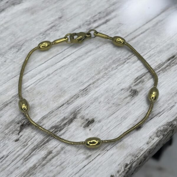 GIHQ0650 PULSERA EN ACERO QUIRURGICO DORADA