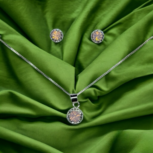 CONJUNTO DE PLATA FINA CON CIRCON Y CRISTAL ROSA CUARZO