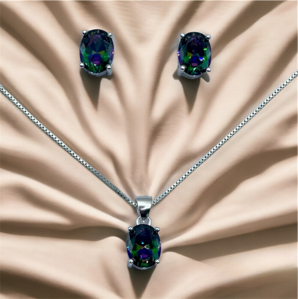 CONJUNTO DE PLATA FINA CON CIRCON TORNASOL OVALADO