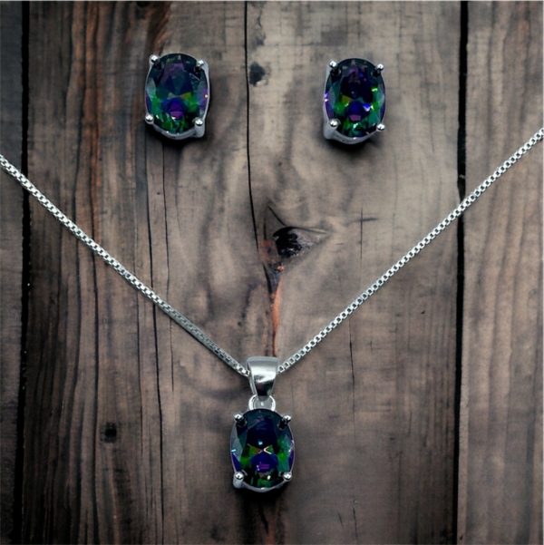 CONJUNTO DE PLATA FINA CON CIRCON TORNASOL OVALADO