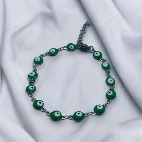 PULSERA EN ACERO QUIRURGICO OJOS VERDES