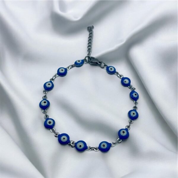 PULSERA EN ACERO QUIRURGICO OJOS AZUL