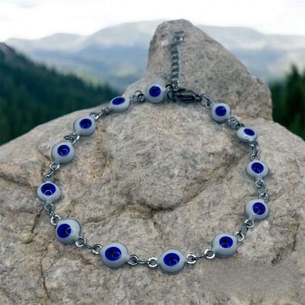 PULSERA EN ACERO QUIRURGICO OJOS BLANCOS