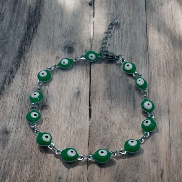PULSERA EN ACERO QUIRURGICO OJOS VERDES