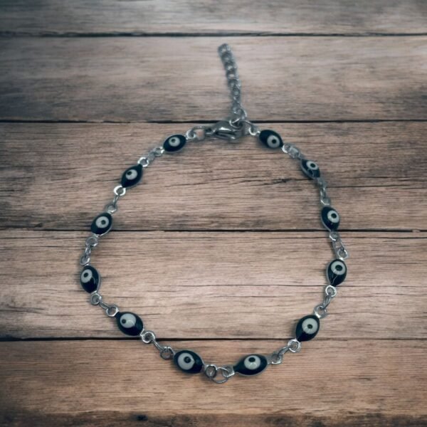 PULSERA EN ACERO QUIRURGICO OJOS NEGROS