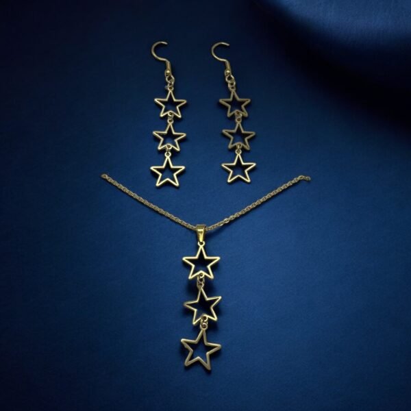 CONJUNTO EN ACERO QUIRURGICO ESTRELLAS LARGO DORADO