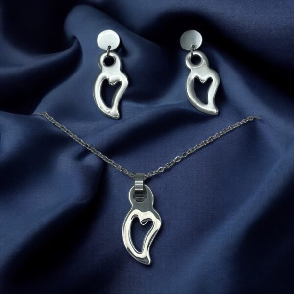 CONJUNTO EN ACERO QUIRURGICO CORAZON ALARGADO