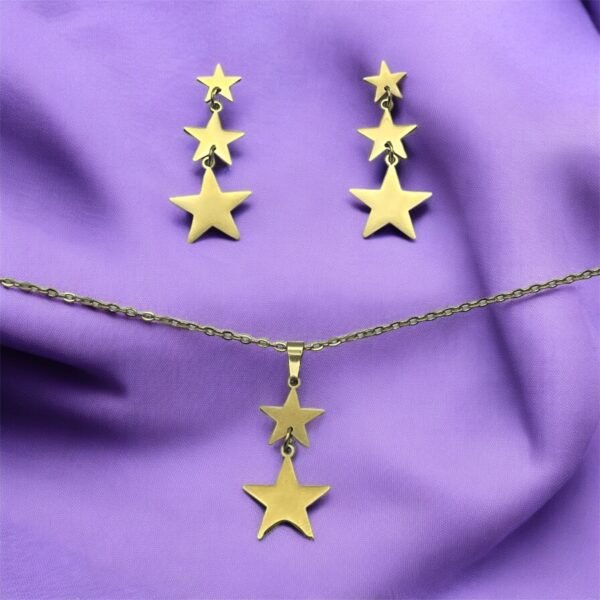 CONJUNTO EN ACERO QUIRURGICO ESTRELLAS DEGRADÉ DORADO