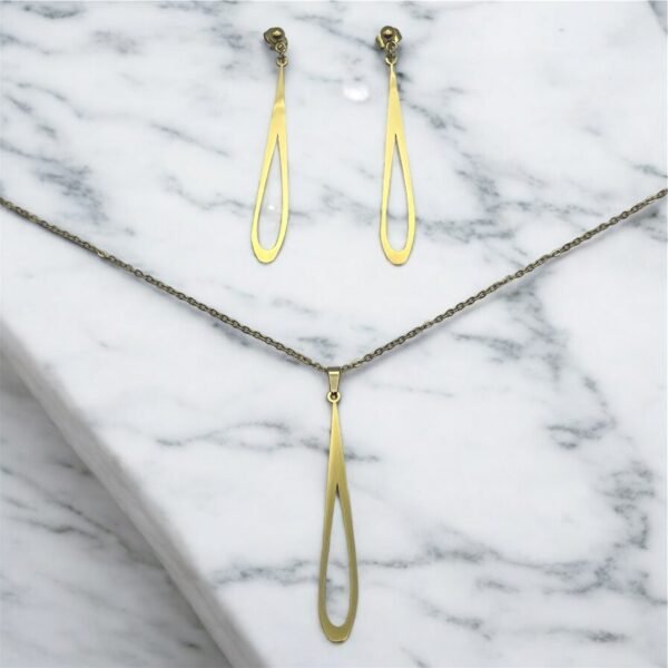 CONJUNTO EN ACERO QUIRURGICO LARGO DORADO